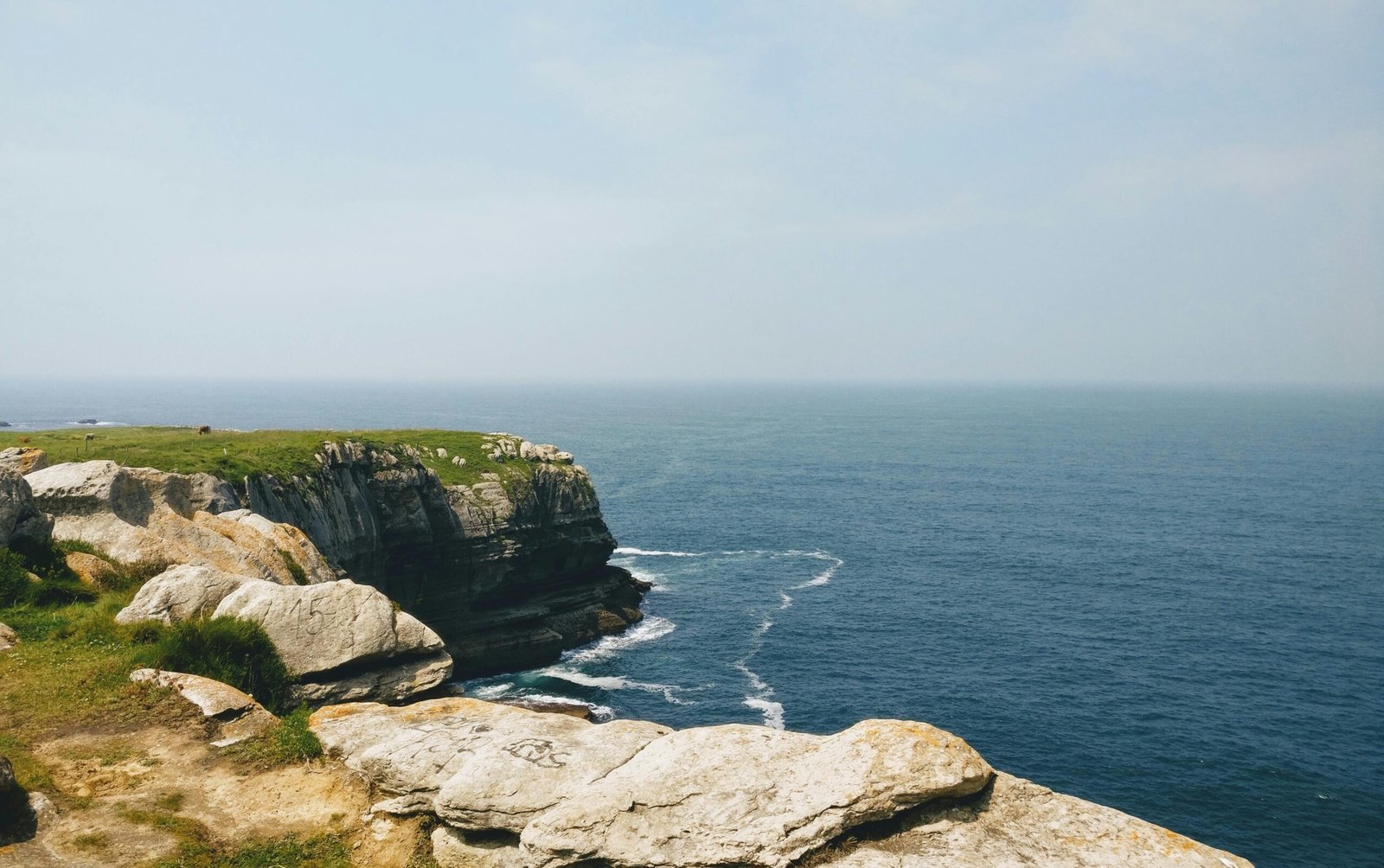 Breathtaking view of cliffs and ocean in Santander, Cantabria, Spain.